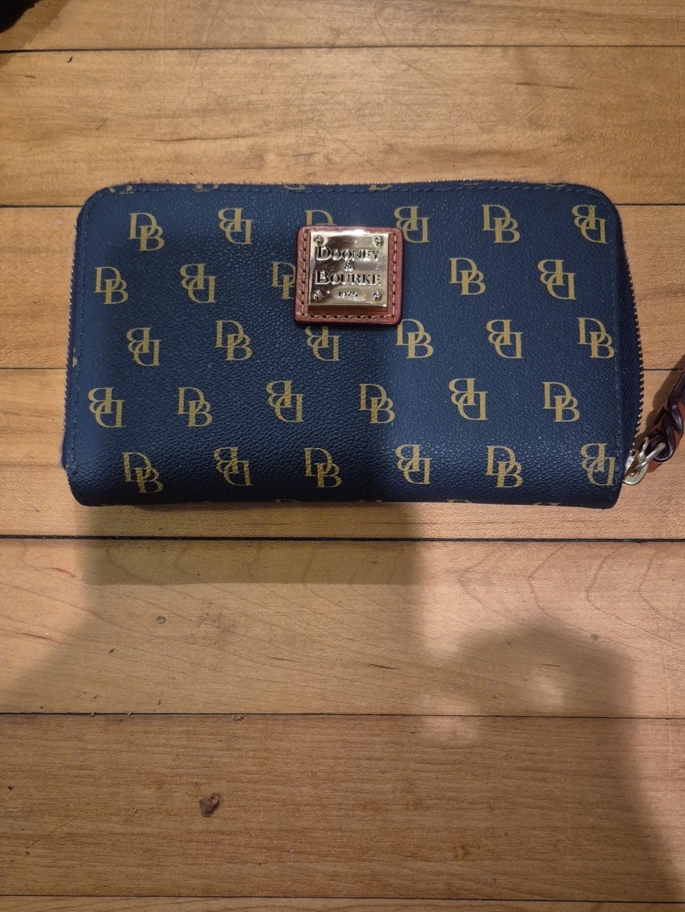 Dooney & Bourke Navy and Gold Logo Zip Wallet with Brown Trim